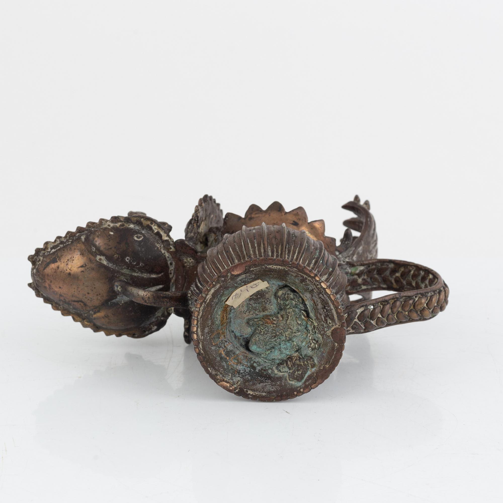 A group of three Indian bronze figures and an ewer, 20th century.