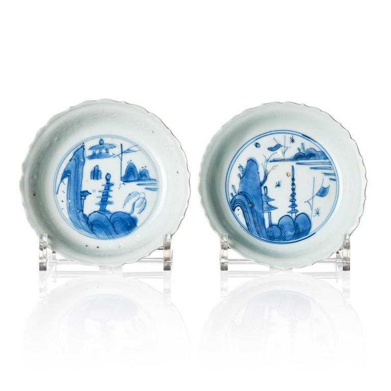 A pair of blue and white 'anhua' dishes, Ming dynasty, Wanli (1572-1620).