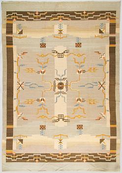 A 1930's Finnish flat weave carpet. Circa 350 x 246 cm.