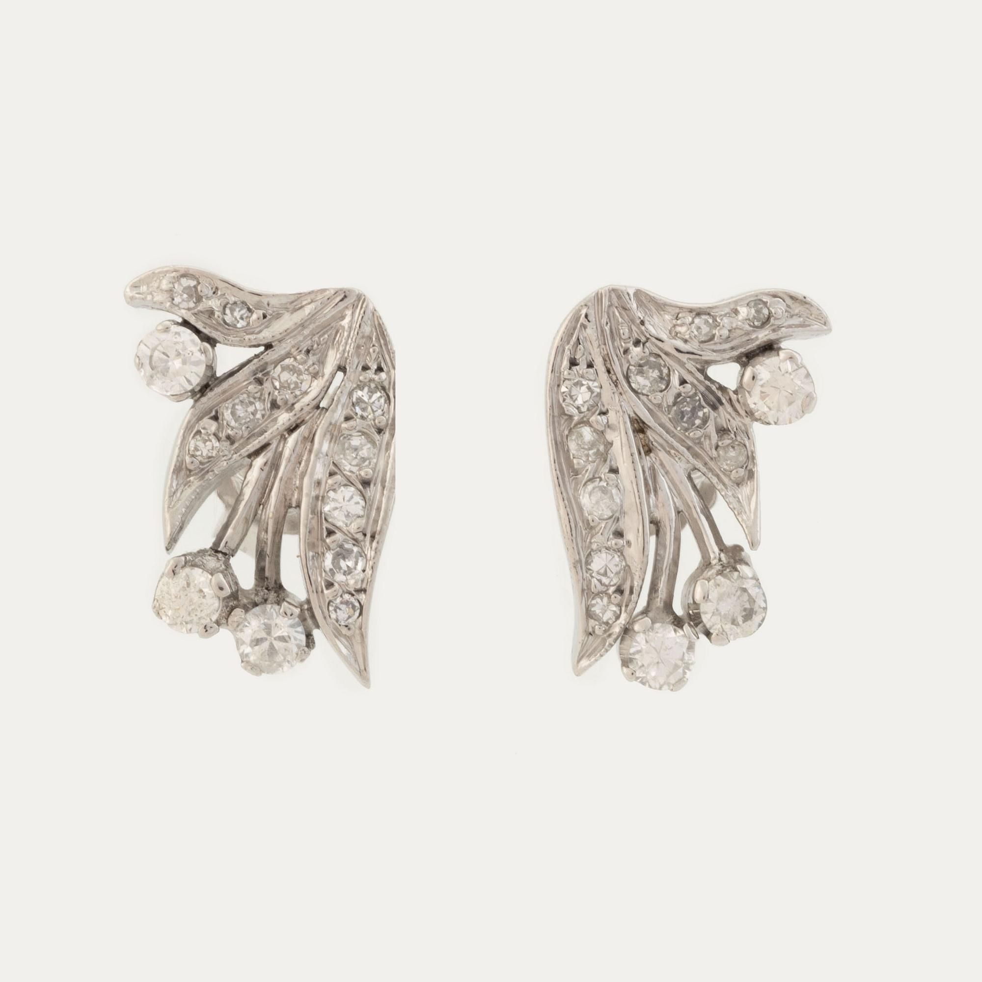 Diamond leaf earrings.