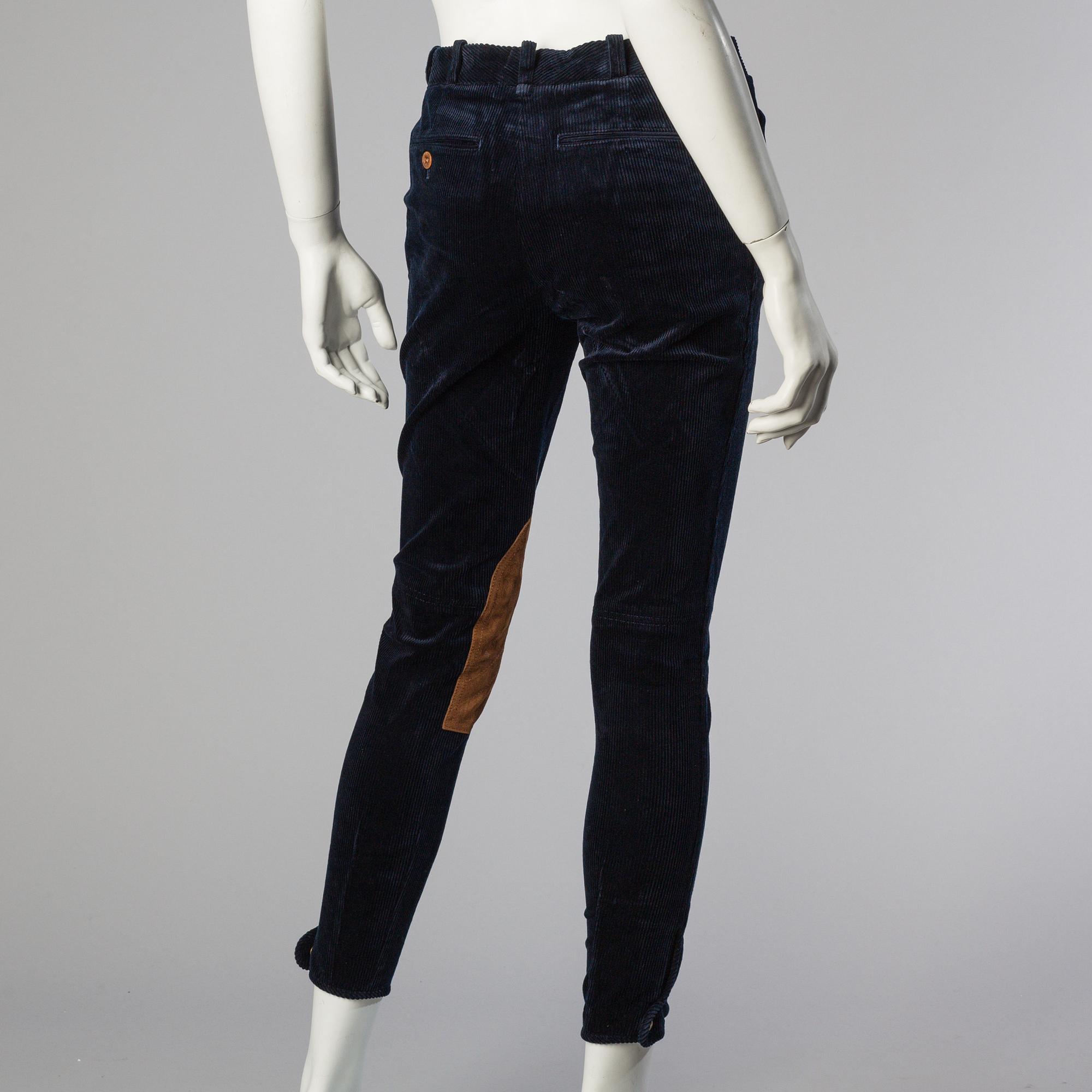 Three pair of trosers by Ralph Lauren.