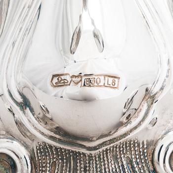 Kynttelikkö, hopeaa, Kultakeskus, Hämeenlinna 1987-88.