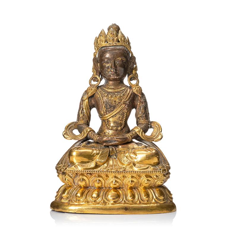 A Mongolian, partly gilt reoussé sculpture of Amitayus, 19th Century.