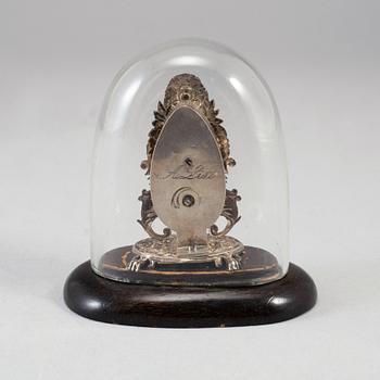 A 19th century miniature silver mantle clock.