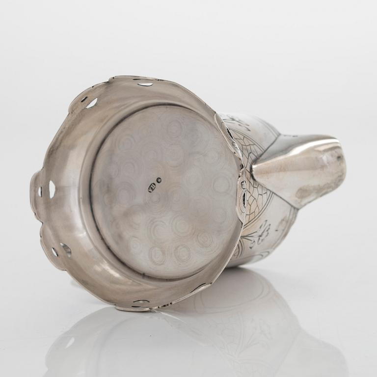 A silver cream jug, maker's mark Pavel Amerikantsev, Moscow 1908-26.