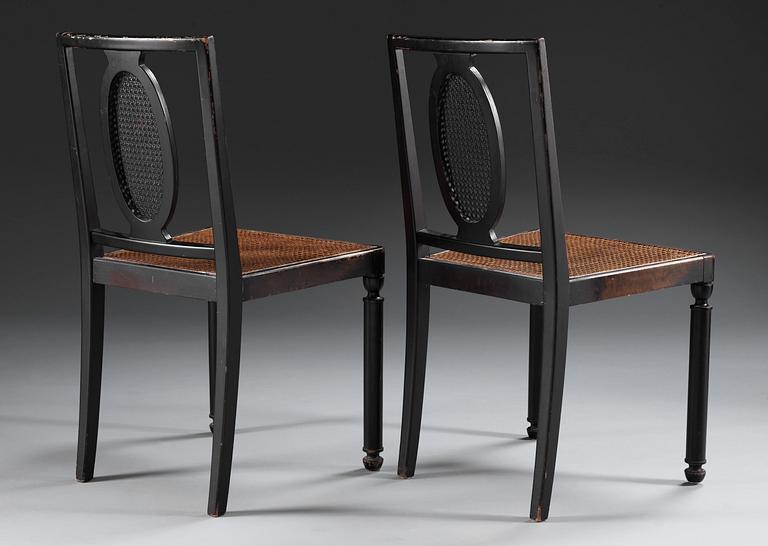 A pair of Axel-Einar Hjorth 'Coolidge' black stained chairs by NK 1927.