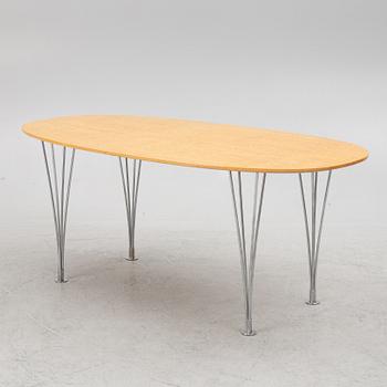 Bruno Mathsson & Piet Hein, a dining table/desk, 'Superellipse', Mathsson International, Värnamo, 1980s.