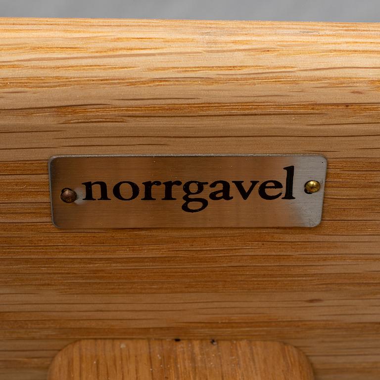 An oak dining table by Norrgavel.