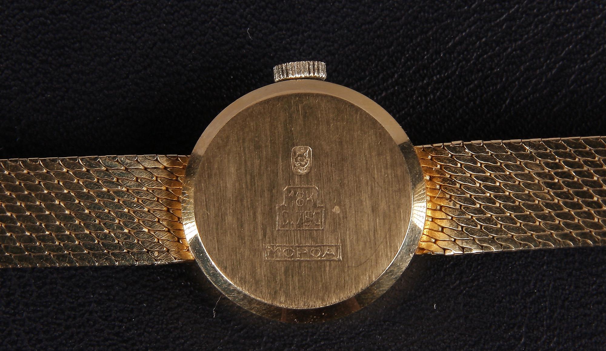 DAMARMBANDSUR, guld 18K, märkt Swaving, totalvikt 21 gram.