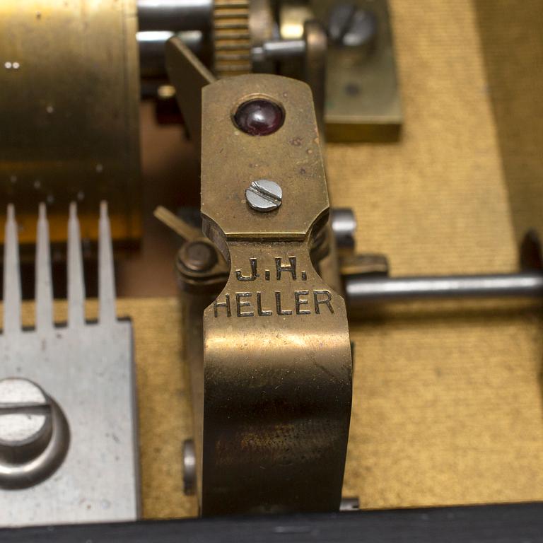 A mahogany music box from J.H. Heller, Bern, Switzerland, late 19th Century.