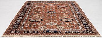 A semi-antique Orientall carpet c. 318 x 202 cm.