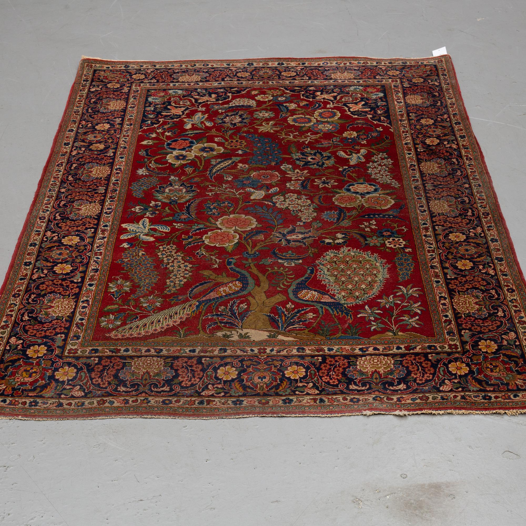 MATTO, a semi-antique Kashan, ca 207-209 x 136-137 cm.