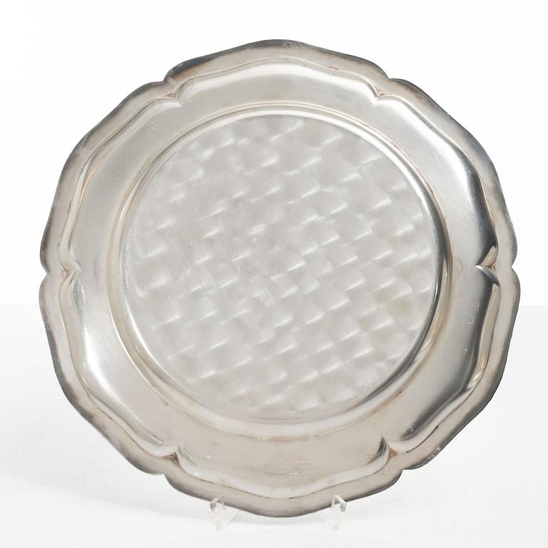 A set of seven silver plates (6+1), including GAB, Stockholm 1943.