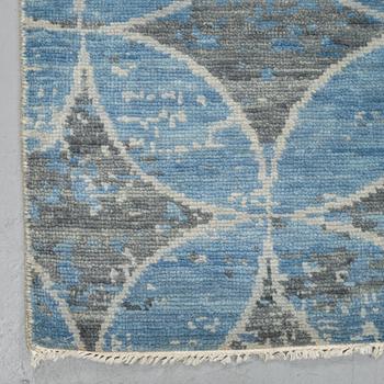A carpet, oriental, ca 305 x 246 cm.