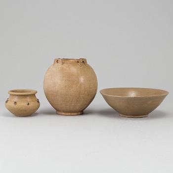 A brown glazed bowl and two pots, South East Asia, 17th Century or older.