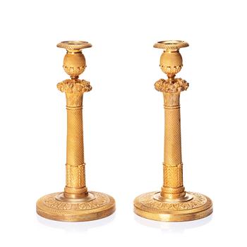 A pair of French Empire candlesticks, early 19th century.