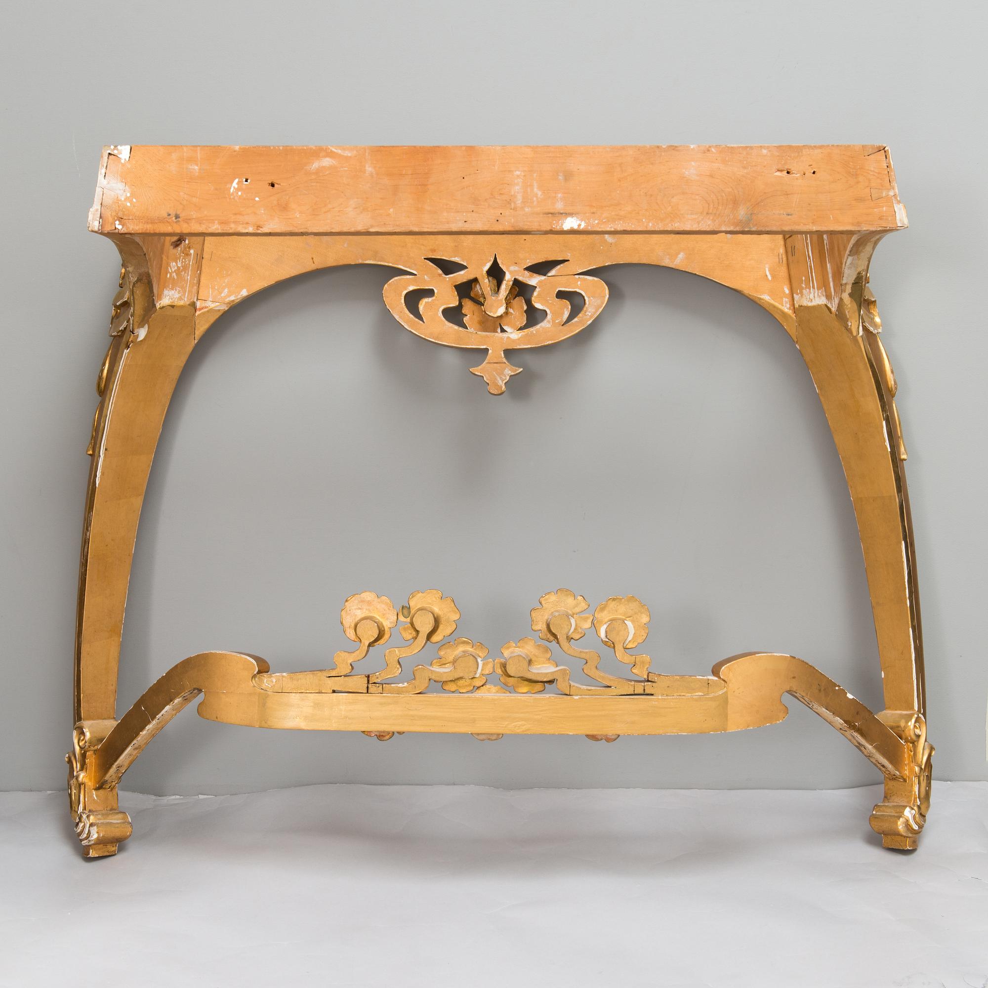 An Art Nouveau mirror with console table from early 20th century.