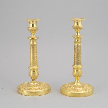 A pair of Empire candlesticks, first half of the 19th century.