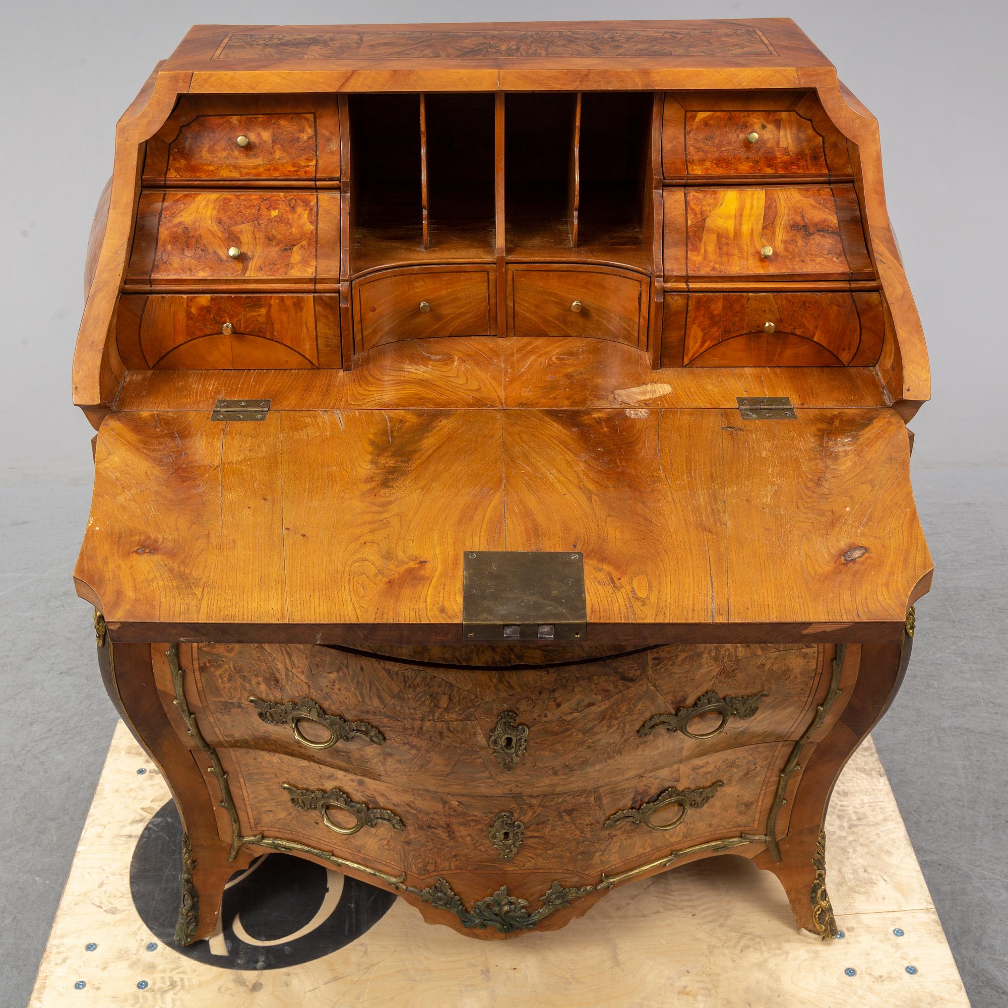 A 19th century rococo style secretaire.