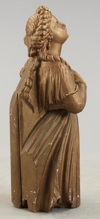 A 19th century figure-head.