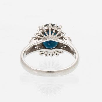 Ring, Platinum 850 with brilliant and tapered baguette cut diamonds and an oval faceted sapphire.