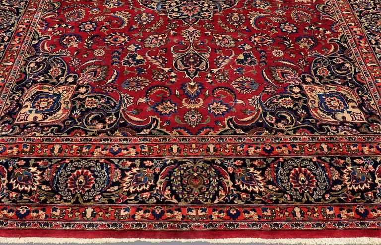 A CARPET, Mashad, signed, ca 385 x 293 cm.