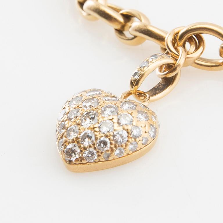 Cartier, Armband av 18K guld med runda briljantslipade diamanter.