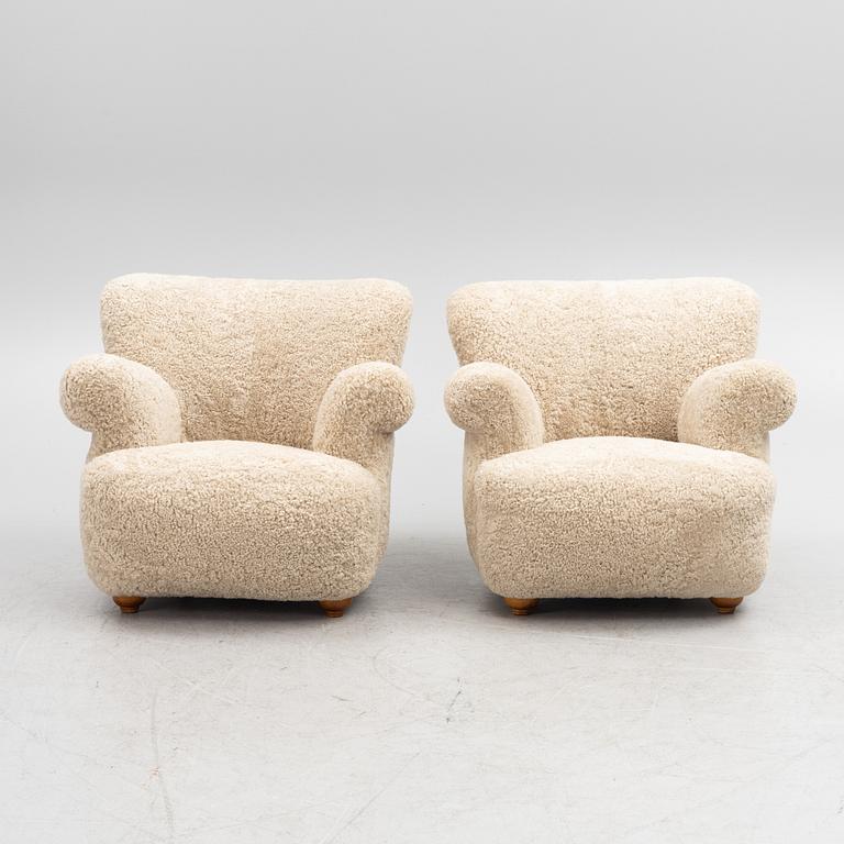 A pair of Swedish Modern armchairs, mid-20th Century.