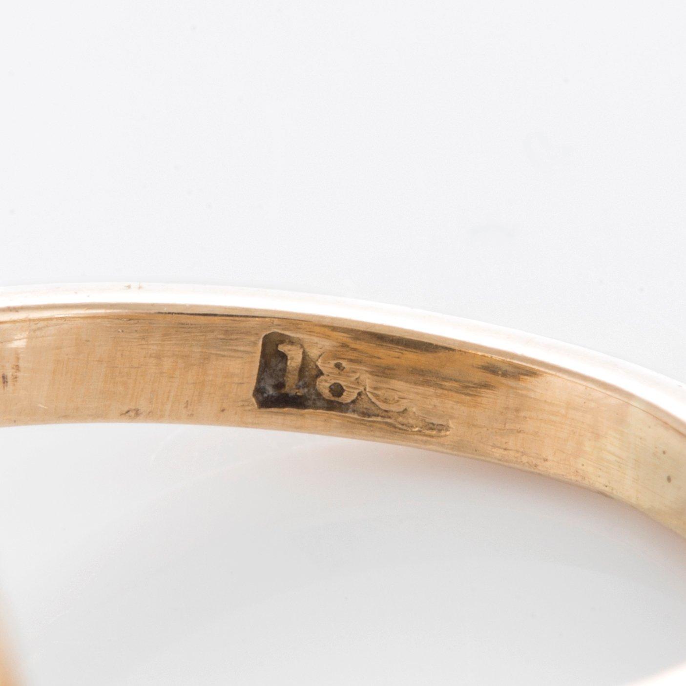 Opalring med runda briljantslipade diamanter total vikt ca 1.20 ct.