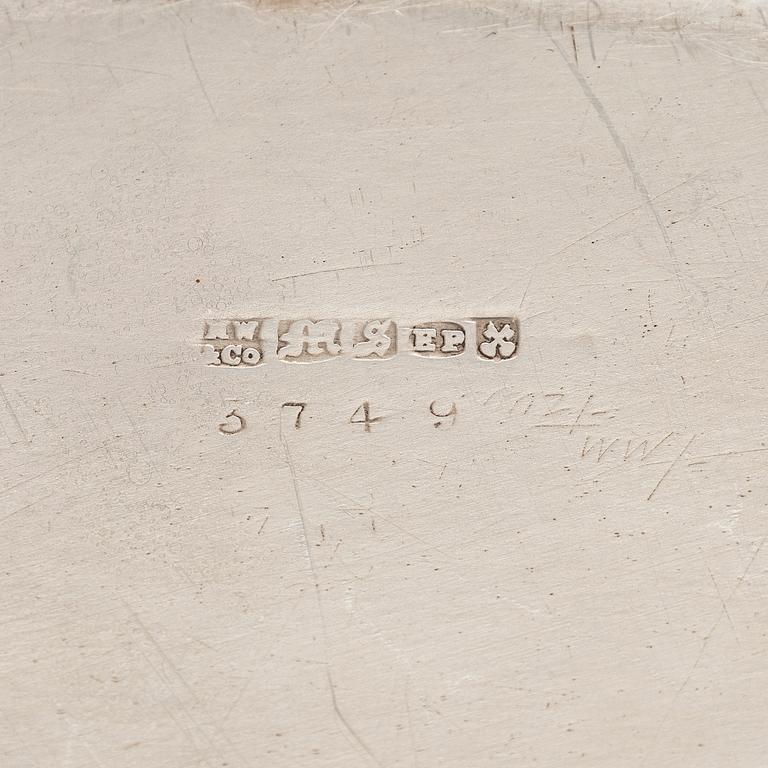 A set of four silver plated entree dishes, England.