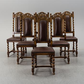 Six first half of the 20th century baroque style oak chairs.