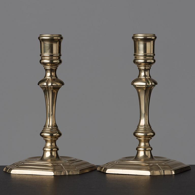 A pair of late baroque 18th century paktong candlesticks.