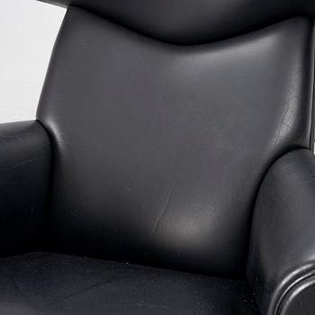 Hans J. Wegner, fåtölj med fotpall, "Ox Chair", EJ-100, Erik Jørgensen Møbelfabrik A/S, Svendborg, Danmark.