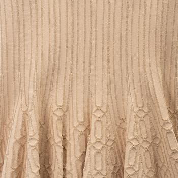 Alaïa, a beige patterned dress, size 36.