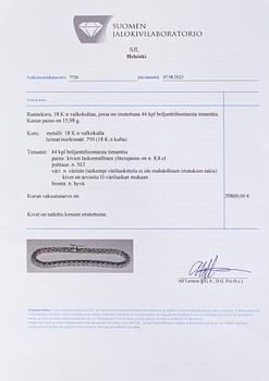 An 18K whitegold tennisbracelet with brilliant cut diamonds approx 8.80 ct in total. With certificate.
