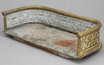 BRASSKYDD, mässing, omkring 1900.