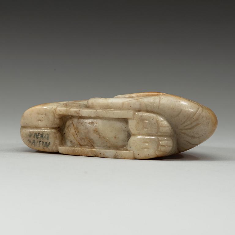 A carved nephrite figurine, late Ming dynasty (1368-1643).