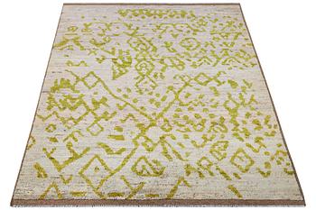 A Moroccan rug, c. 237 x 164 cm.