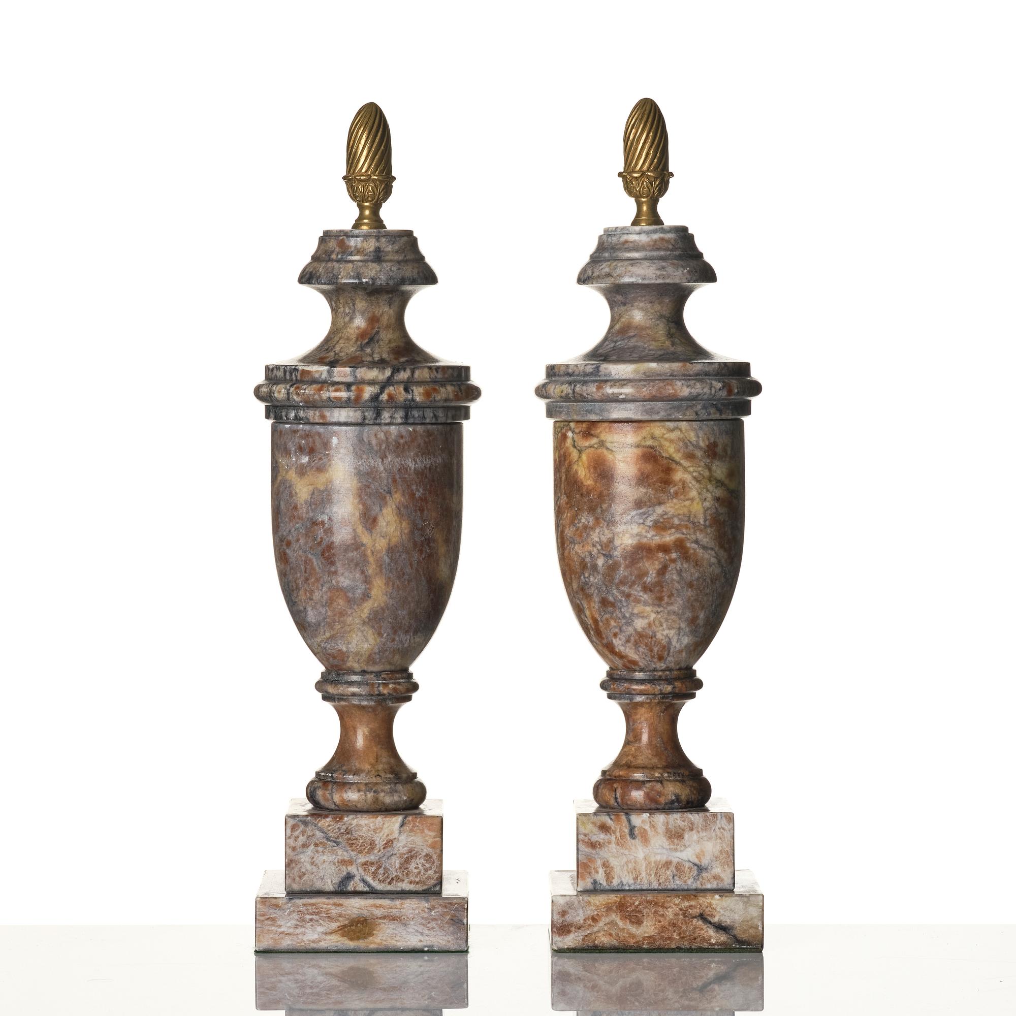 A pair of marble urns, around year 1900.