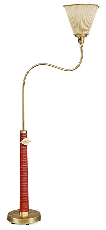 A Hans Bergström brass and red leather floor lamp, Ateljé Lyktan, 1930's, model 500.