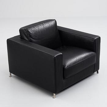 Flexform, a black leather and metal 'Bob' easy chair, post 1997.