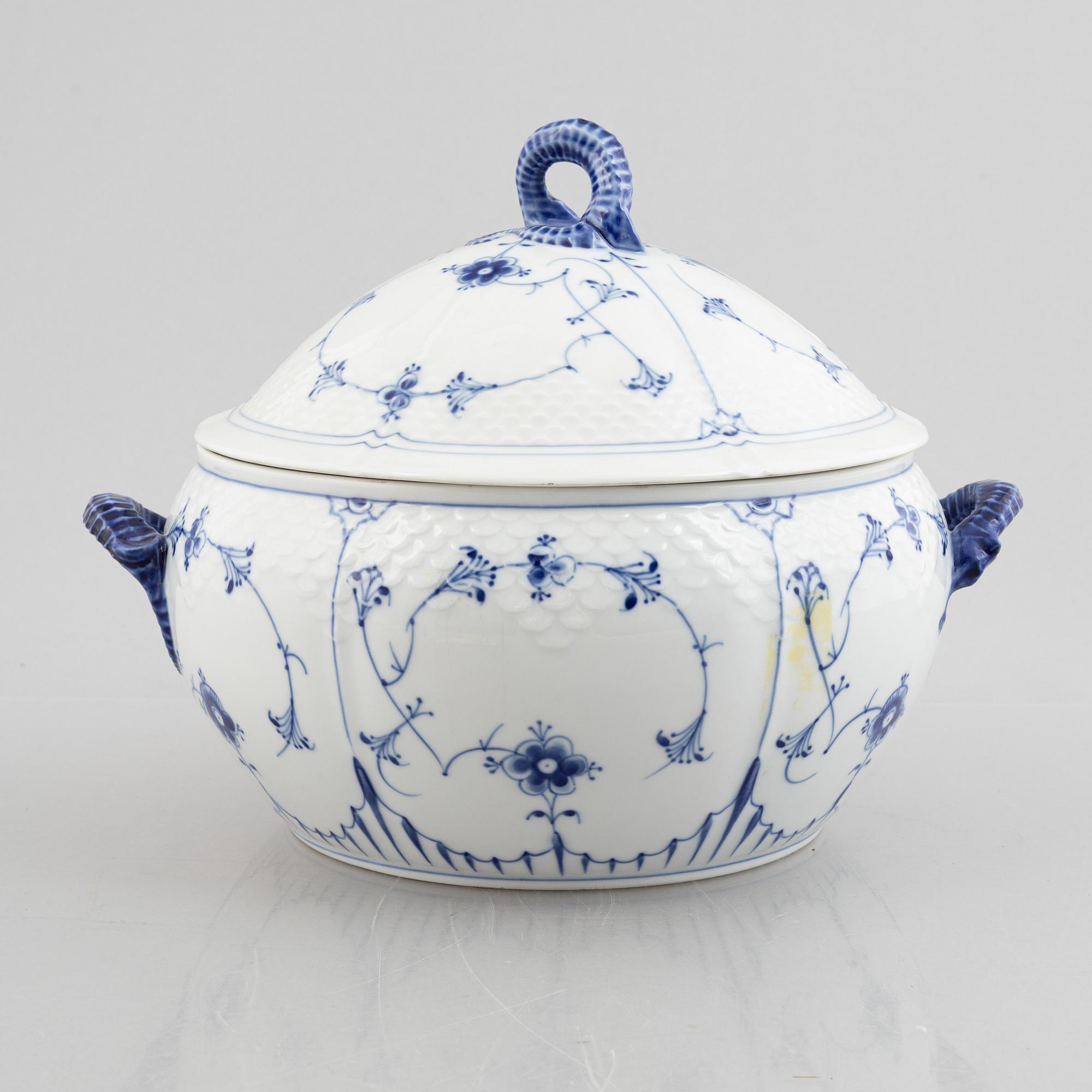 Royal Copenhagen, a 116-piece 'blue Fluted' porcelain dinner and coffee service, half lace, Denmark, mostly 1923-34.