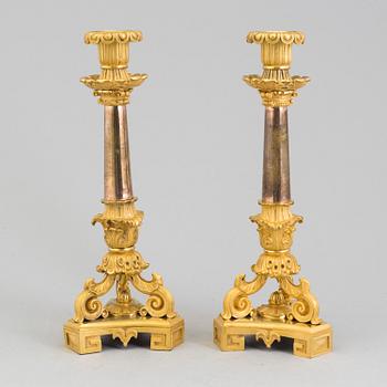 A pair of gilt bronze candlesticks, France, mid 19th Century.