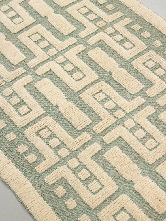Sigvard Bernadotte, A CARPET, knotted pile in relief, ca 178 x 112 cm, signed SB (Sigvard Bernadotte).