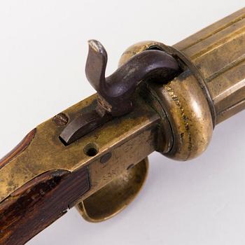 A second half of the 19th Century brass percussion revolver by Johan Engholm.