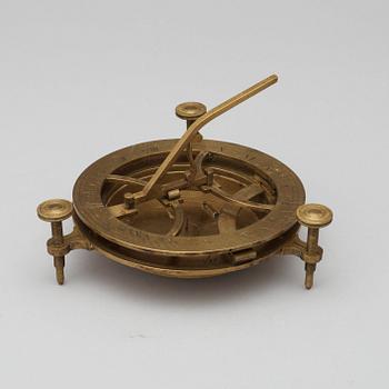 A Russian 18/19th century brass equinoctial sundial.