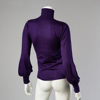 Three sweaters by Ralph Lauren.