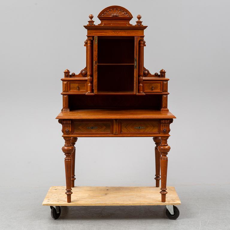 A late 19th century walnut veneered desk.