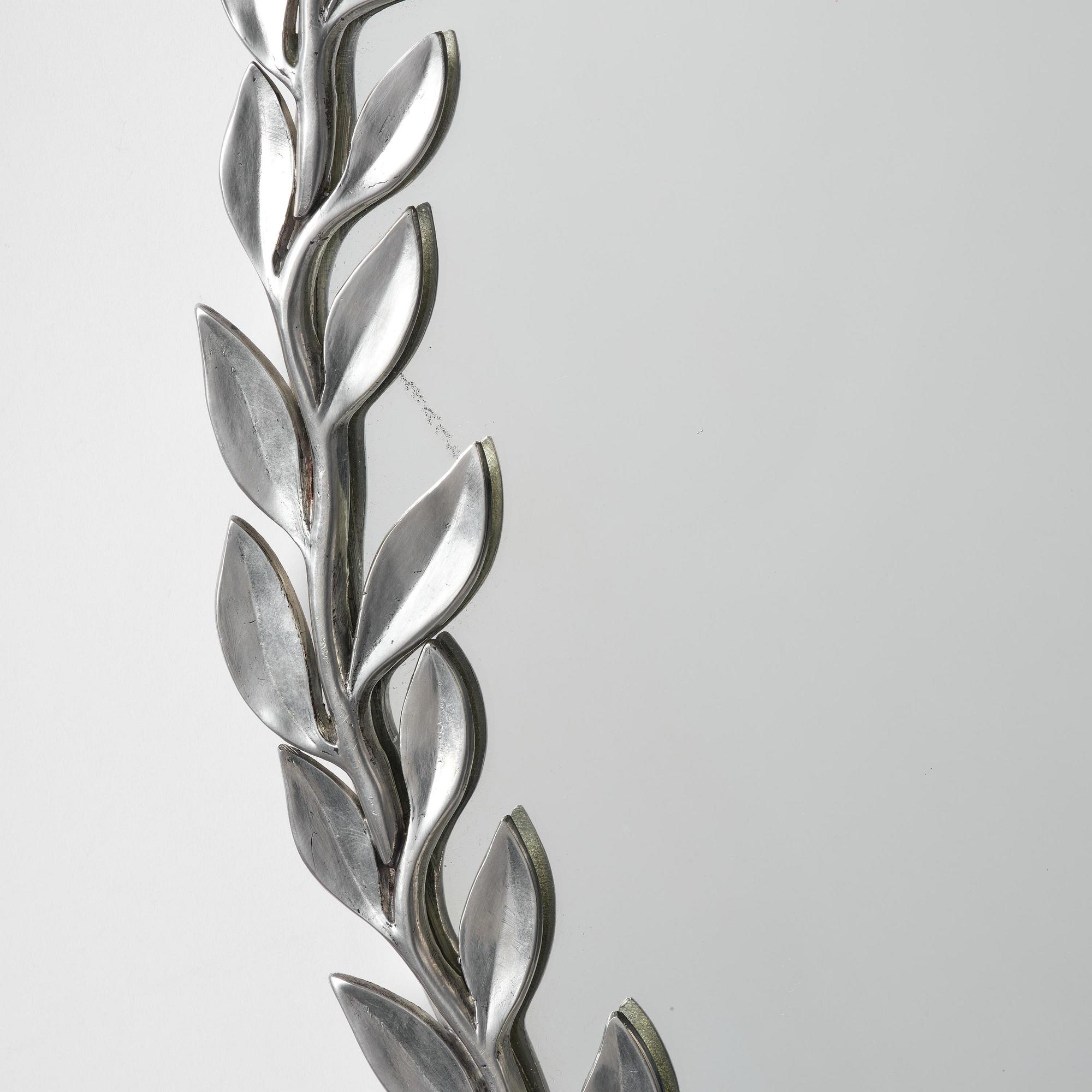 Estrid Ericson, a pewter framed mirror, model "A 2492", Svenskt Tenn, Stockholm, 1957.