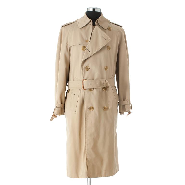 BURBERRY, a beige cotton trenchcoat.